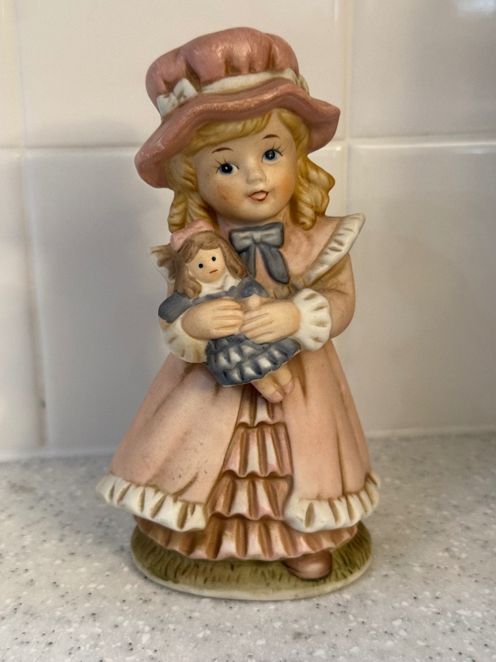 Homco girl with doll